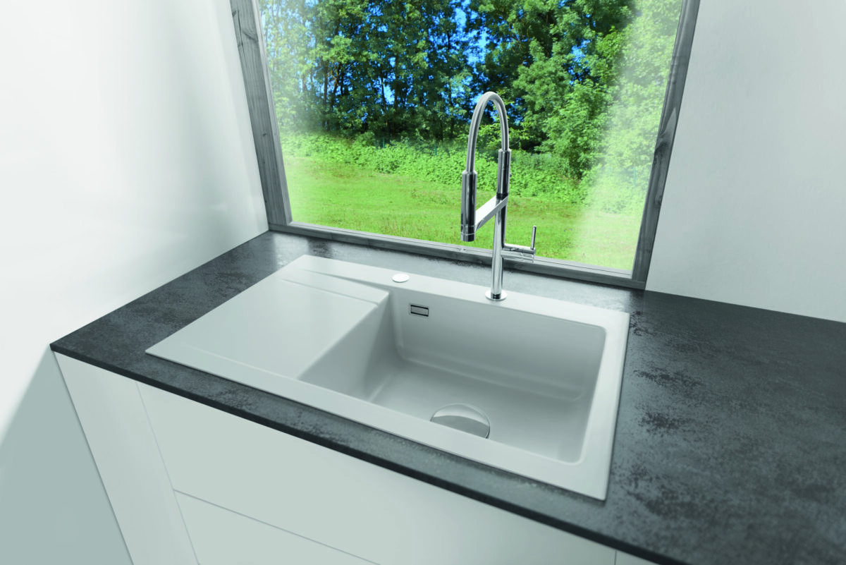 Bright views and clean design: Systemceram’s matte ceramic sink fits right into any modern family kitchen—with serious everyday durability.