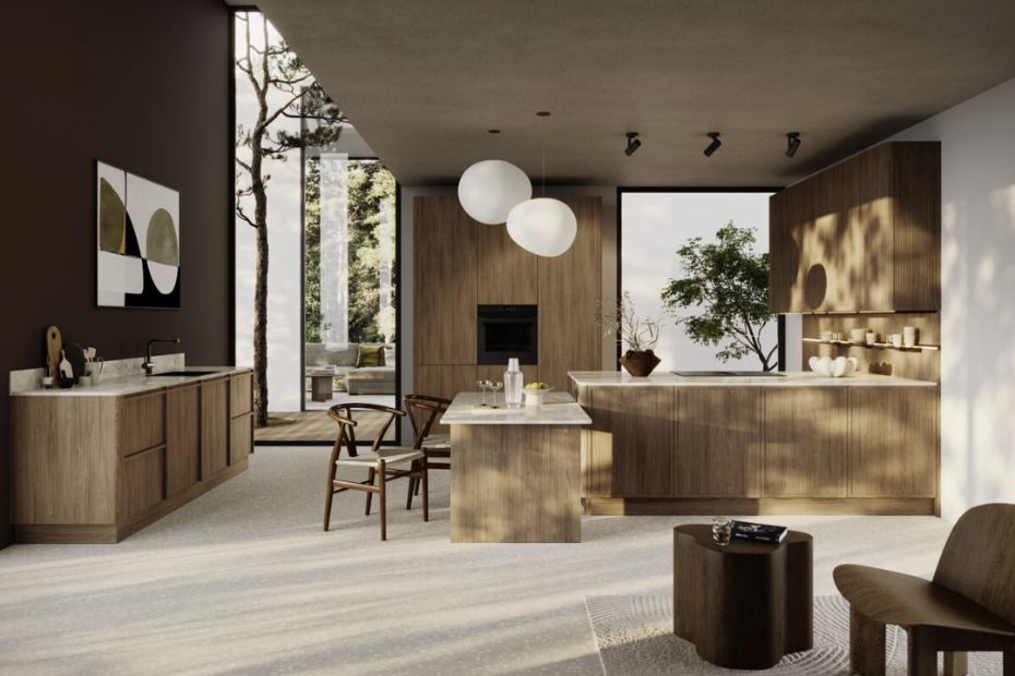 Rotpunkt kitchen in warm wood tones with an island, round pendant lights and modern seating.