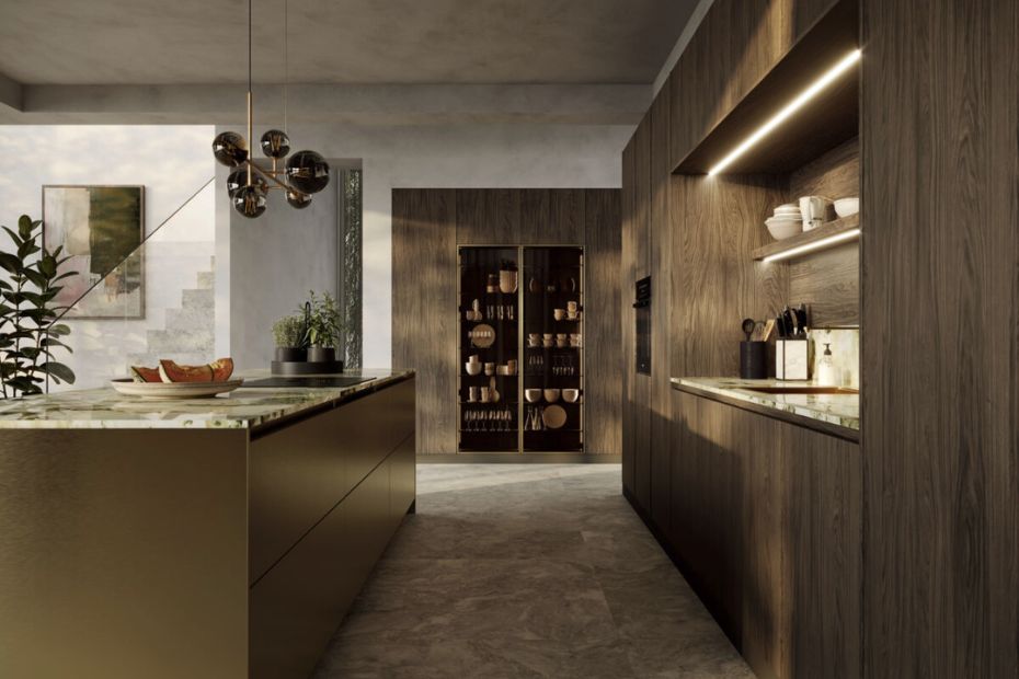 Rotpunkt kitchen with dark wood cabinetry, illuminated shelving and a gold-toned island.