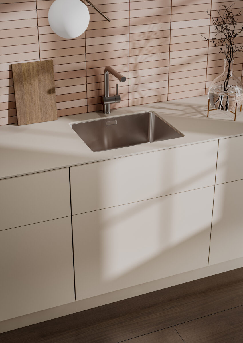 Bright modern kitchen with sand gray cabinets, apricot tile backsplash, and a satin-matte finish