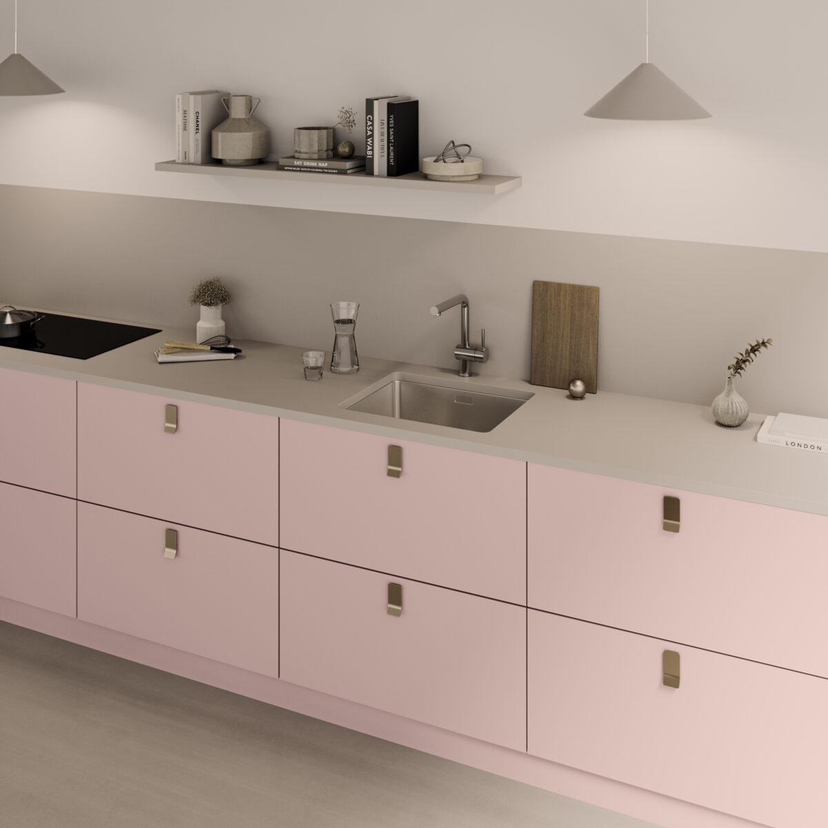 Minimalist kitchen with soft rosé-colored cabinets, light countertop, and clean modern design